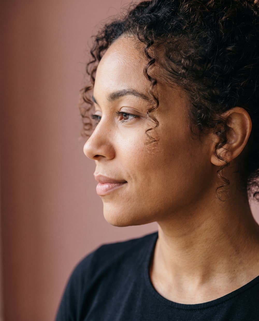Portrait of a woman with natural curly hair